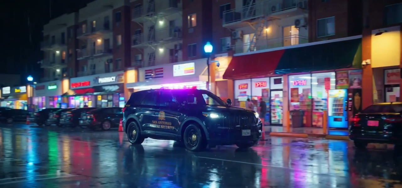 SAVS patrol vehicle on a San Antonio nightlife strip at night